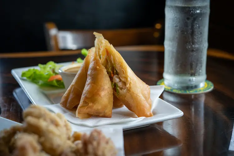 spring rolls leaning on eachother